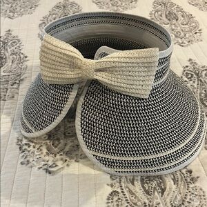 Elegant Black and White Woven Visor for Sun. Rolls up for easy packing